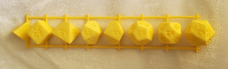 An 8-piece set of Hangul dice.